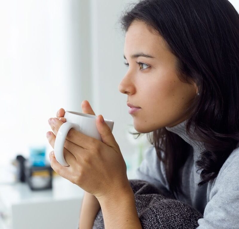 A woman wondering what common pregnancy symptoms she might have.