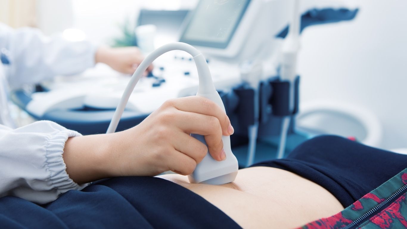 Pregnant woman receiving an ultrasound